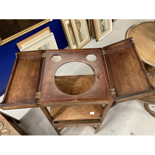 101 - 19th cent. Mahogany washstand opening fold over top to reveal holes for wash basin etc, with single ... 