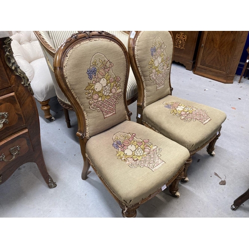 105 - Late 19th cent. Walnut framed upholstered nursing chairs with turned and fluted legs on castors, a p... 