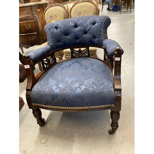 108 - Early 20th cent. Mahogany upholstered chair on turned ring legs.