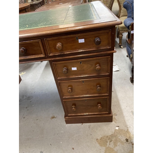 109 - 19th cent. Mahogany pedestal desk, the top with moulded edge and green gold tooled leather above thr... 