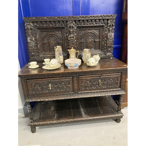 120 - 19th cent. Northern European sideboard/court cupboard with heavily carved front and back. 55ins. x 7... 