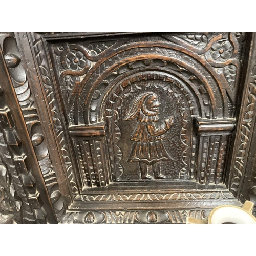 120 - 19th cent. Northern European sideboard/court cupboard with heavily carved front and back. 55ins. x 7... 