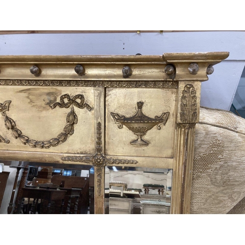 124 - 19th cent. Gilt over mantel mirror with a sphere decorated cornice over a frieze with swags and urns... 