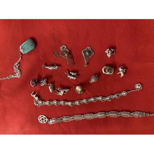 223 - Jewellery: Collection of white metal jewellery to include charms, earrings, bracelets, etc. All test... 