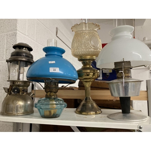 24 - Lighting: Oil lamps to include Duplex Aladdin Gem fire brass lamps, Hipolto lamp, T. Bowatt & Son co... 