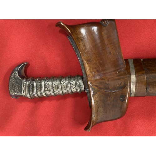 241 - Edged Weapons: 19th cent. Malay executioner's Kris, the silver cased handle with Niello work of scro... 