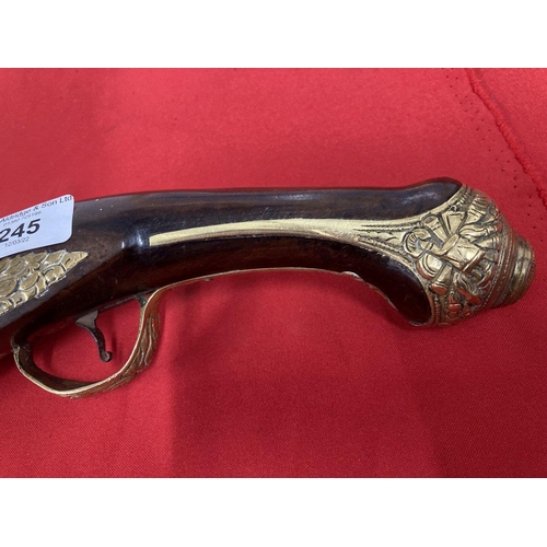 245 - 18th cent. Turkish flintlock with brass decorated lock plate and pommel. 20ins.