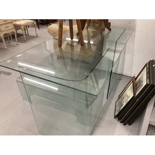 27 - Art & Design: Retro clear glass desk. 55ins. x 28ins. x 29ins. Plus a glass coffee table. 34ins. x 3... 