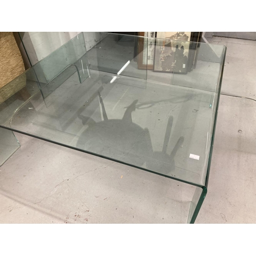 27 - Art & Design: Retro clear glass desk. 55ins. x 28ins. x 29ins. Plus a glass coffee table. 34ins. x 3... 