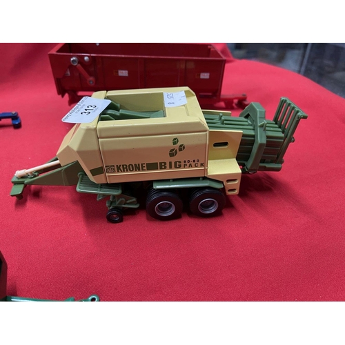 313 - Toys: Diecast Britain's selection of farm machinery includes Krone Big Pack Baler, Keenan Mixer Wago... 