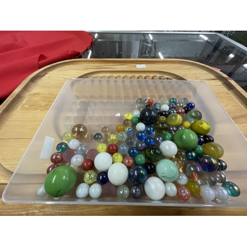 328 - Games & Pastimes: 20th cent. Glass marbles and treen carved board.