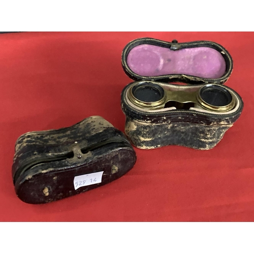 356 - Early 20th cent. Opera glasses decorated with mother of pearl, plus one other pair, both in fitted c... 