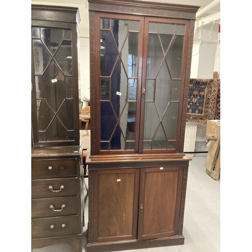 36 - Early 20th cent. Mahogany two part bookcase, the thirteen pane glazed doors above two blind doors on... 