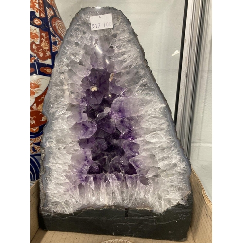 393 - Mineral Specimens: Large amethyst half. Core width 8½ins. Height 12ins. Plus small spray of malachit... 