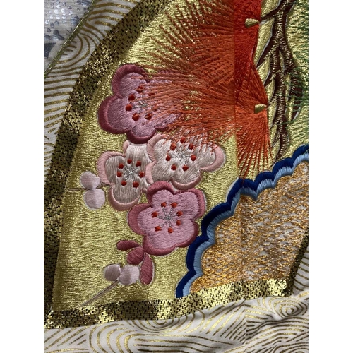 406 - Mid 20th cent. Oriental silk wedding kimono decorated with gold line embroidery, phoenix flying amon... 