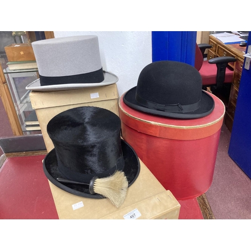 407 - Gentlemen's Millinery: Grey morning top hat, silk top hat, both Austin Reed, and a bowler hat Woodro... 