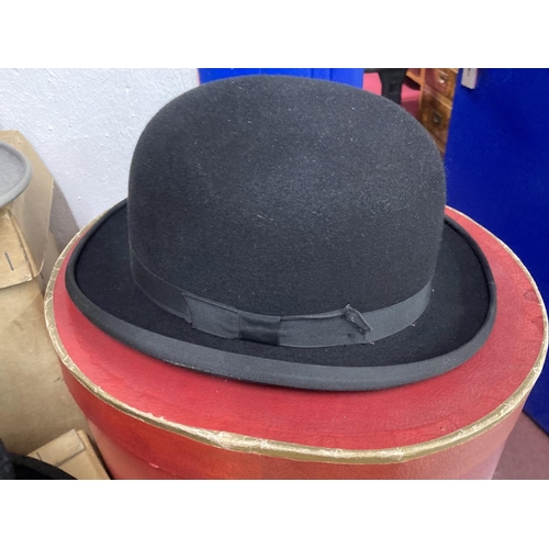 407 - Gentlemen's Millinery: Grey morning top hat, silk top hat, both Austin Reed, and a bowler hat Woodro... 