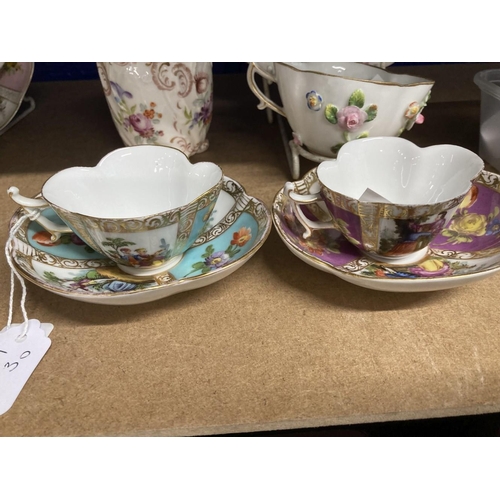 411 - Continental Ceramics: Karl Thieme miniature quatrefoil cups and saucers crossed mark T to base flora... 