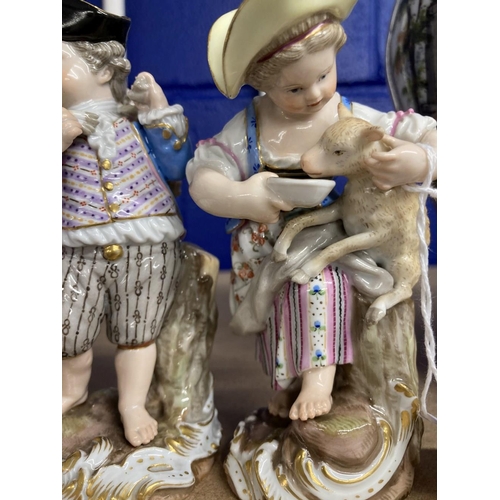 420 - Meissen figurines young shepherdess feeding a lamb, crossed sword mark incised F.19, impressed and r... 