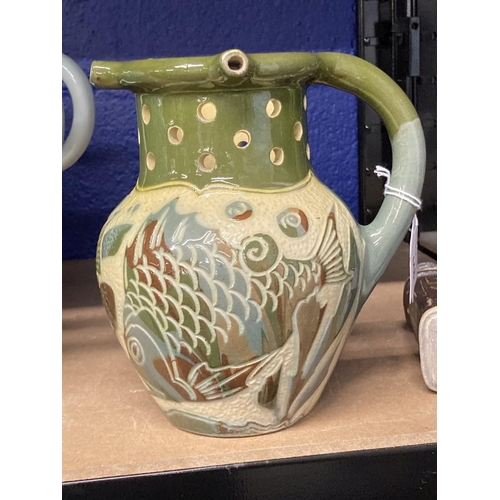 448 - West Country Pottery: Lauder Barum puzzle jug fish and seaweed decoration, inscribed to base Lauder ... 