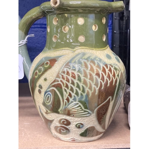 448 - West Country Pottery: Lauder Barum puzzle jug fish and seaweed decoration, inscribed to base Lauder ... 