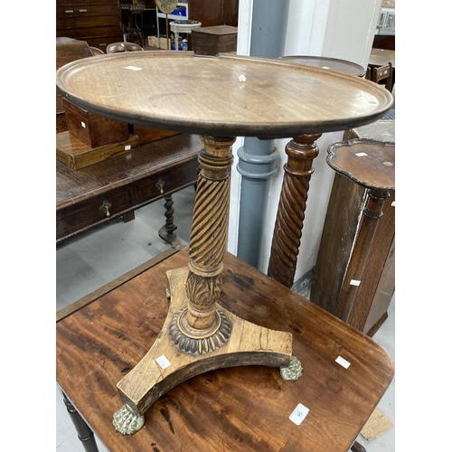 45 - 19th cent. Mahogany table, the top with rounded corners on ring turned legs. 24ins. x 21ins. x 29ins... 