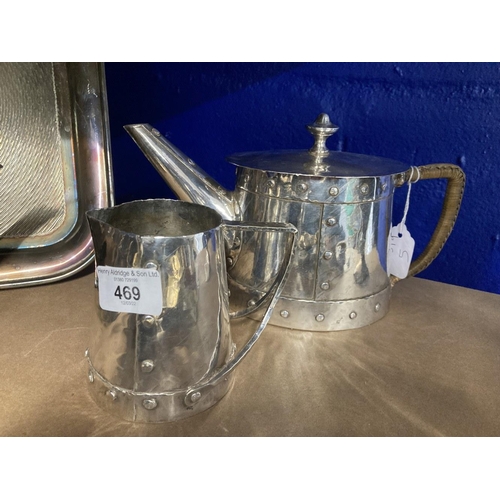 469 - Arts & Crafts: Continental silver wash on copper riveted teapot 4¼ins, cream jug 4¼ins.