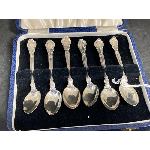 497 - White metal set of six coffee spoons in case (A/F) marked Sterling, tests as silver. Weight 2.32oz.