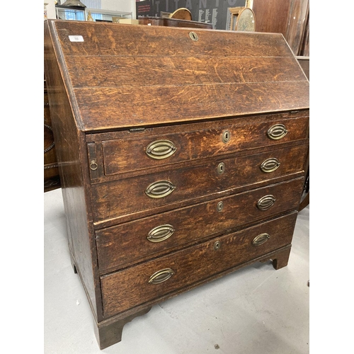 50 - 19th cent. Oak country bureau with fitted interior. 37ins. x 20ins. x 42ins.