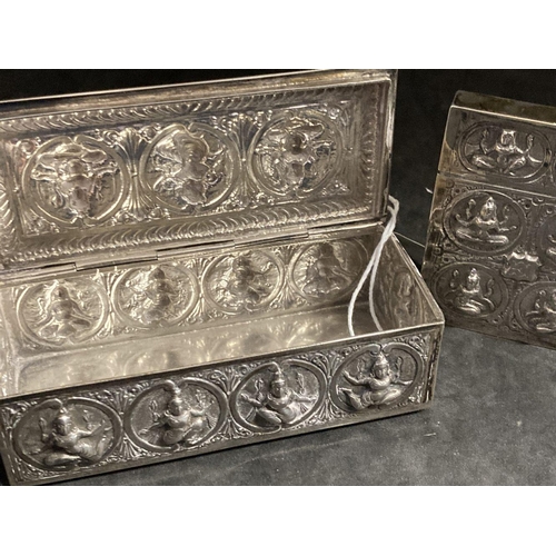 511 - Asian White Metal: Oblong trinket box decorated with repoussé roundels the Hindu Goddess, white meta... 