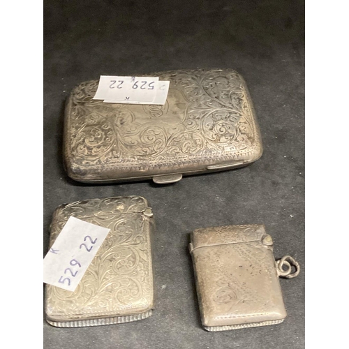 513 - Hallmarked Silver: Cigarette case and two Vesta cases all hallmarked Birmingham. Plus hallmarked sil... 