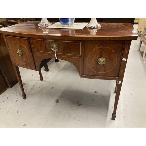 53 - Georgian bow fronted mahogany sideboard with a single central drawer flanked by two deep cellarette ... 