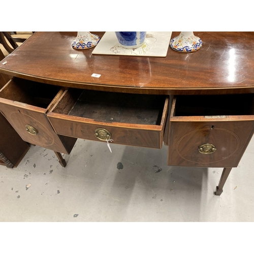 53 - Georgian bow fronted mahogany sideboard with a single central drawer flanked by two deep cellarette ... 