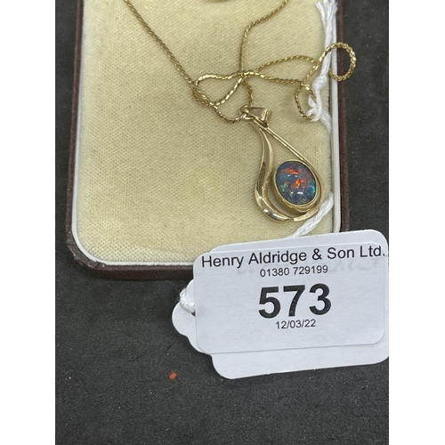 573 - Hallmarked Jewellery: 9ct gold zip link chain with a pendant attached set with an oval opal. Length ... 