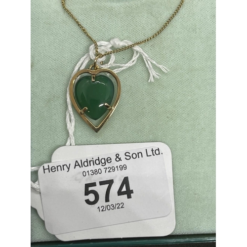 574 - Jewellery: Yellow metal necklet with heart pendant attached set with a green agate, tests as 18ct go... 