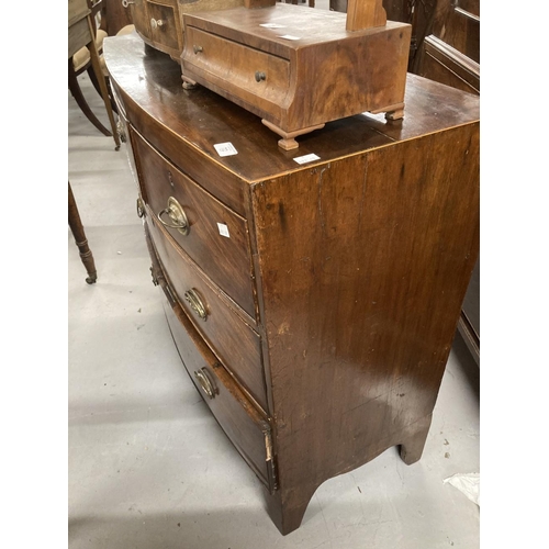 72 - 19th cent. Mahogany bow front chest of two short over three long drawers on bracket feet with oval b... 