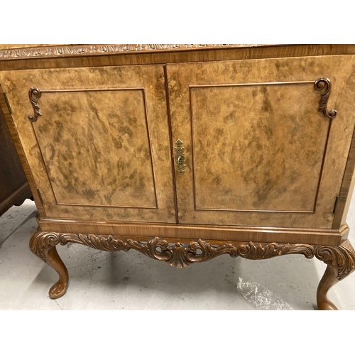 78 - 20th cent. Walnut cocktail cabinet.