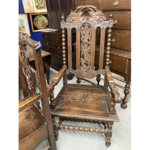 86 - 19th cent. Oak Carolean style elbow chair, carved back and seat, barley twist and carved supports.