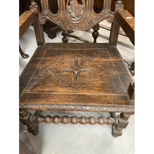 86 - 19th cent. Oak Carolean style elbow chair, carved back and seat, barley twist and carved supports.