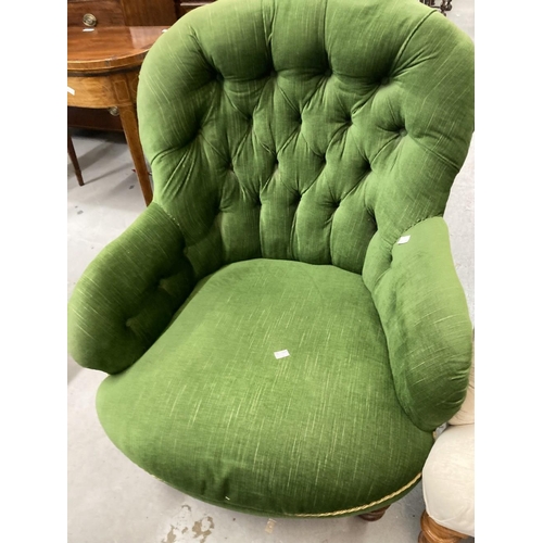 98 - Victorian button back upholstered armchair with turned legs on castors. Width 28ins. Depth 32ins. Pl... 