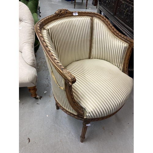 99 - Late 19th cent. French walnut salon chair on reeded legs and striped upholstery. Width 25¾ins. Depth... 