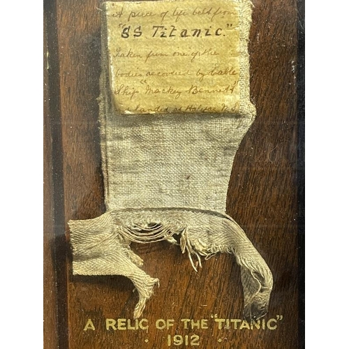 258 - R.M.S. TITANIC: Extremely rare life jacket cork section with handwritten notation reads in part, 'A ... 