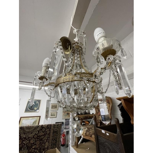 10 - 20th cent. Gilt chandeliers, the largest with six shaped branches, glass sconces and drops, 24ins dr... 