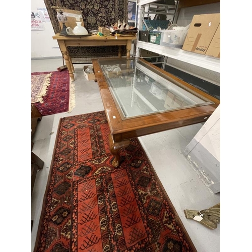 19 - 20th cent. Mahogany extremely large coffee table, the bevelled glass top with mahogany surround on c... 