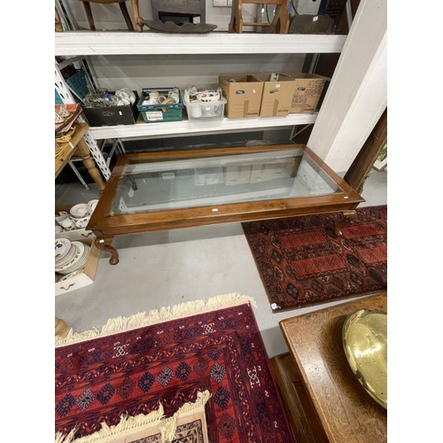 19 - 20th cent. Mahogany extremely large coffee table, the bevelled glass top with mahogany surround on c... 