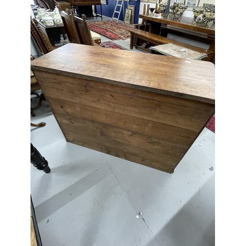 42 - Early 20th cent. Hardwood cupboard with two drawers above a central panel flanked by two doors all w... 