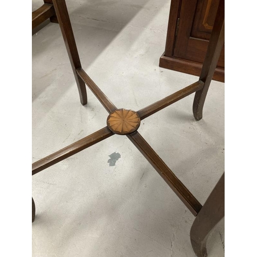 44 - Edwardian octagonal inlaid table the top with inlaid central panel on square legs, tied stretcher wi... 