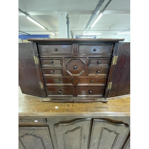 61 - 18th cent. Continental table cabinet with later adaptations, the two doors with arched panels ebony ... 