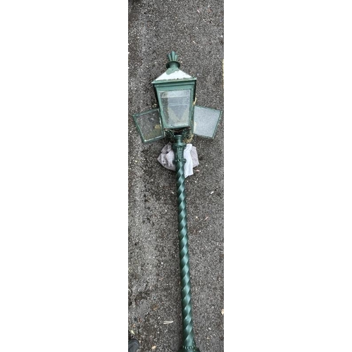 129 - Railwayania: 20th cent. Station lantern spiral cast iron support with aluminium lamp. Ex-property of... 