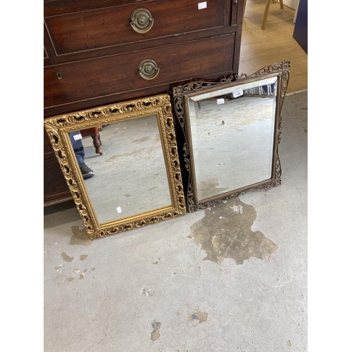 134 - 20th cent. Arts and Crafts brass frame mirror open work pattern design, bevelled glass A/F. 13ins. x... 